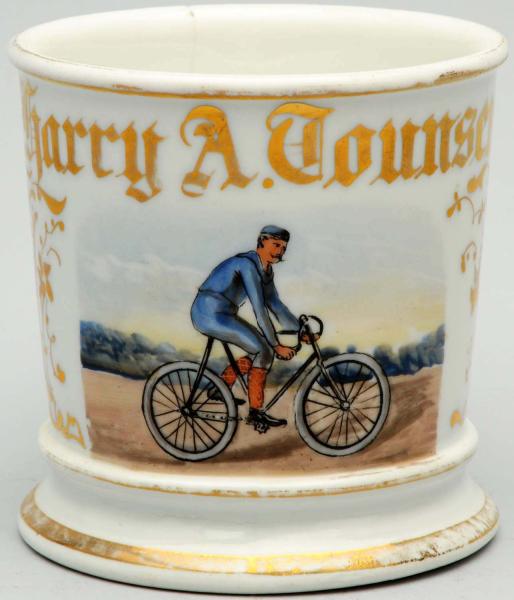 Appraisal: Depicting man riding bicycle Has Harry A Tounsend in gold