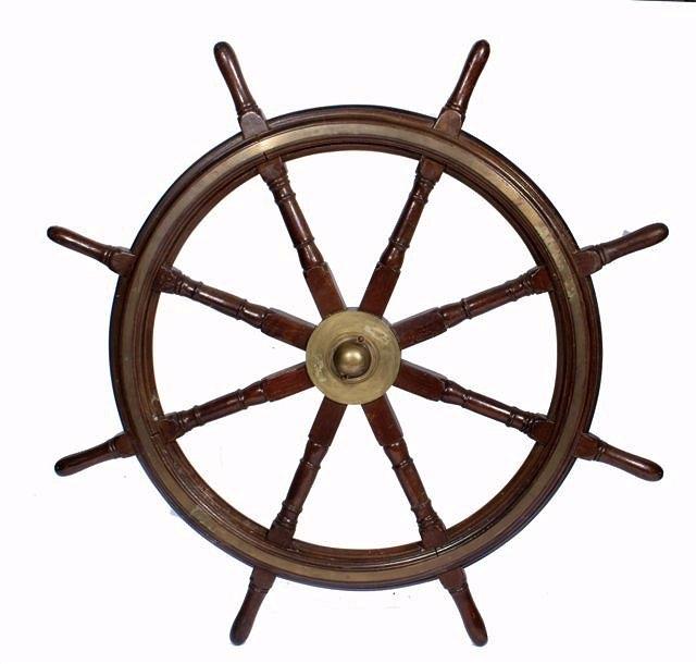 Appraisal: A TEAK SHIP'S WHEEL with eight spokes and brass mounts