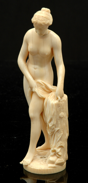 Appraisal: A TH CENTURY CONTINENTAL IVORY FIGURE OF A BATHING WOMAN