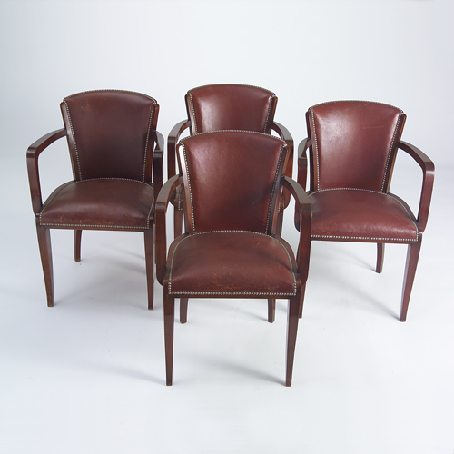 Appraisal: French Deco arm chairs with tapered legs and tacked on