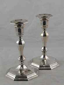 Appraisal: A pair of late Victorian silver candlesticks of George II