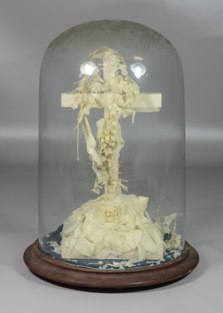 Appraisal: Wax covered wooden cross under glass dome th c h