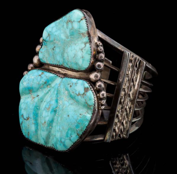 Appraisal: A MASSIVE STERLING SILVER MAN'S CUFF WITH TURQUOISEThe men's bracelet