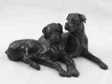 Appraisal: Doris Lindner a bronzed resin group of two dogs Incised