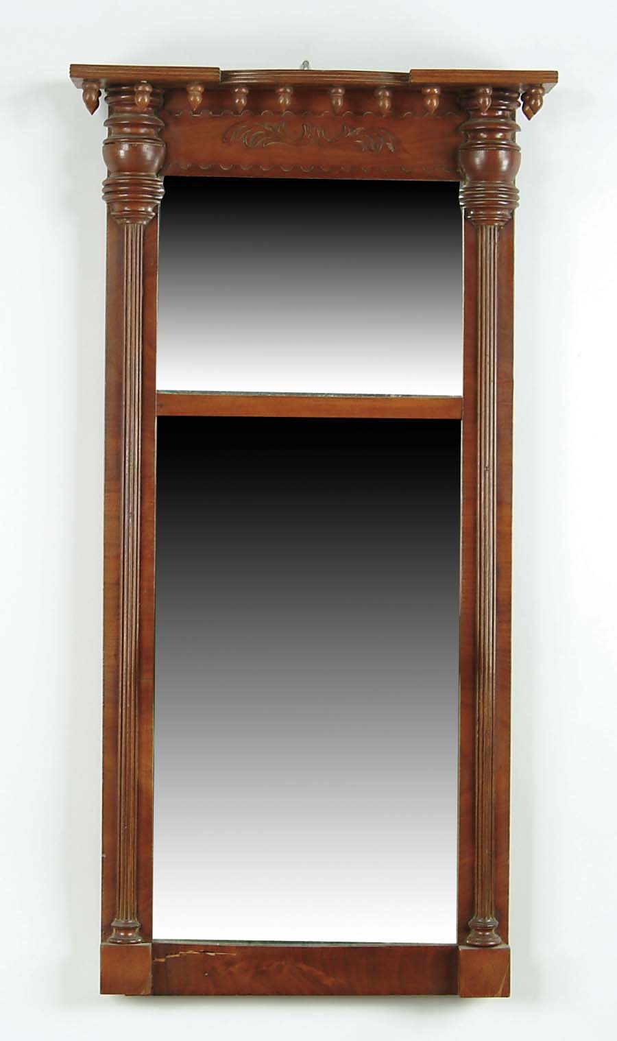 Appraisal: MAHOGANY SHERATON TWO PART MIRROR Flat molded edge crest having