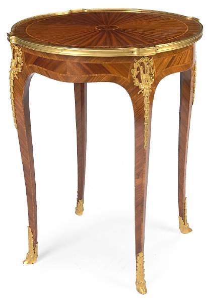 Appraisal: A Louis XV style gilt bronze mounted walnut table Haentges