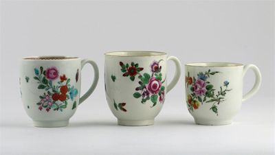 Appraisal: Three Worcester coffee cups each decorated with polychrome flower sprays