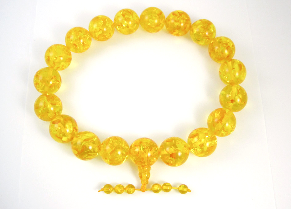 Appraisal: BALTIC PRESSED AMBER BEAD NECKLACE measuring approximately inches in length