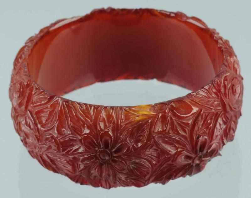 Appraisal: Vintage Bakelite Amber Orange Floral Bracelet Description Translucent amber orange