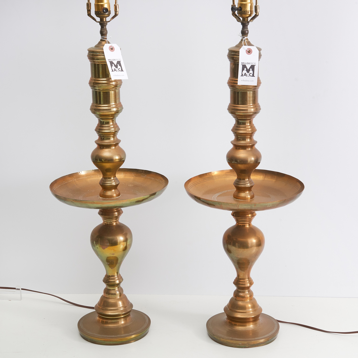 Appraisal: PAIR MID-CENTURY INDIAN BRASS TABLE LAMPS th c unmarked h