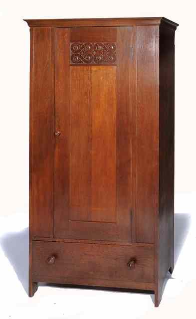 Appraisal: Attributed to Shapland and PetterAn Arts Crafts oak wardrobe with