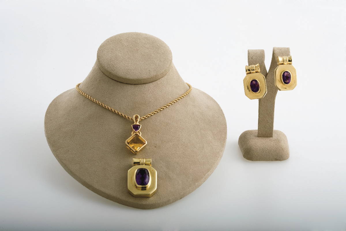 Appraisal: AMETHYST AND GOLD PENDANT AND EARRINGS Together with a second