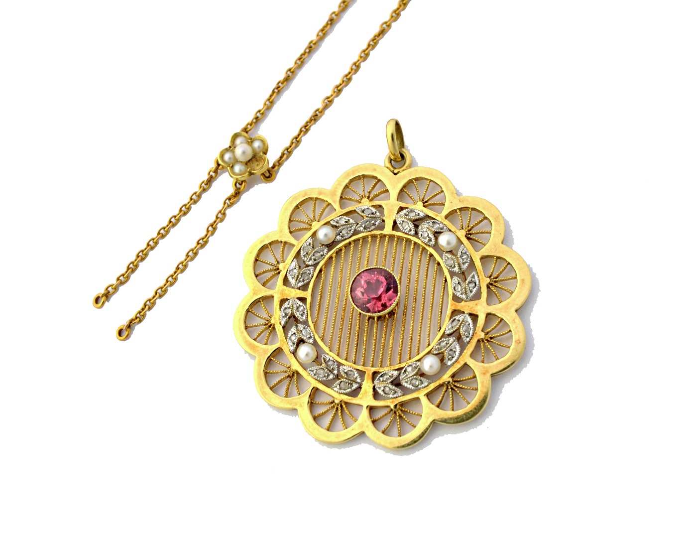 Appraisal: A gold rose diamond seed pearl and pink tourmaline set