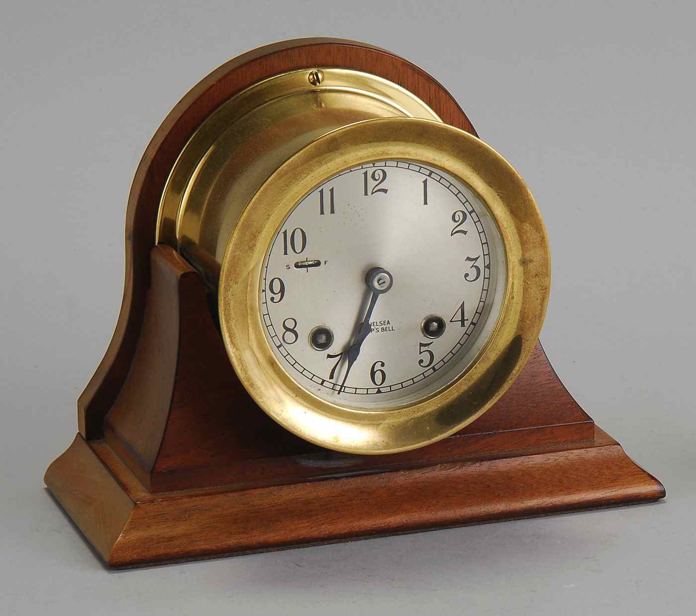 Appraisal: BRASS CASED CHELSEA DESK CLOCK th CenturyShip's bell movement Mounted