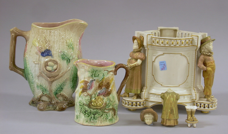 Appraisal: Royal Worcester Gilt Figural Porcelain Jardiniere and Two Majolica Bird's