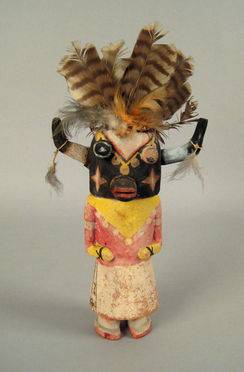 Appraisal: Hopi polychrome wood Kachina doll wearing a feather headdress with