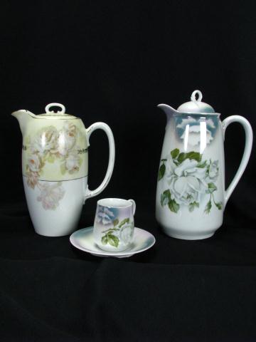 Appraisal: Porcelain Chocolate Set with six cups saucers depicting white roses