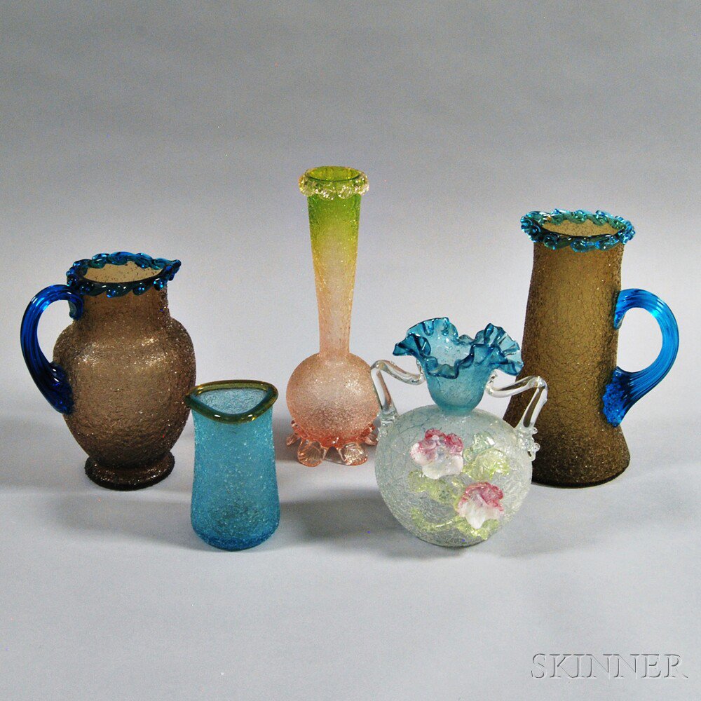 Appraisal: Five Overshot Glass Items two amber pitchers each with applied