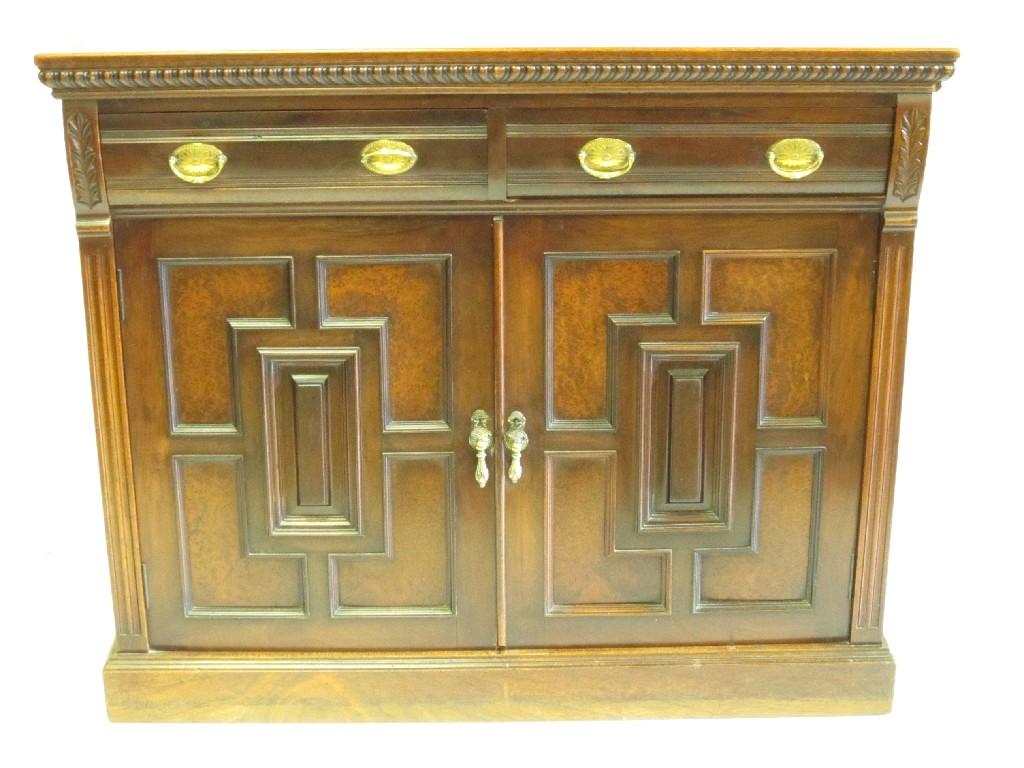 Appraisal: A late Victorian walnut Chiffonier fitted two drawers above pair