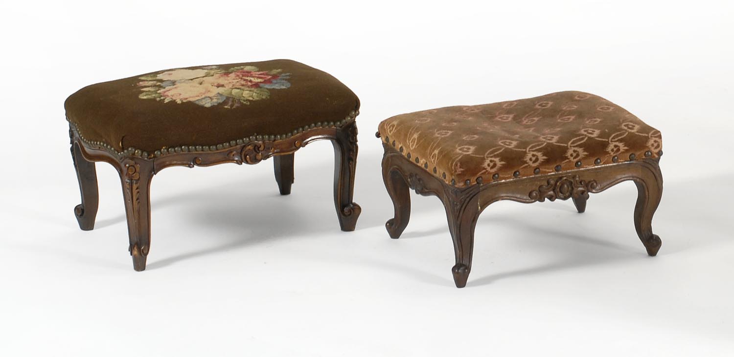 Appraisal: TWO VICTORIAN FOOTSTOOLS with carved walnut frames One with crushed