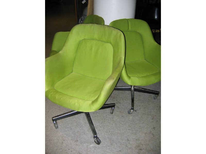 Appraisal: KNOLL INTERNATIONAL Three lime green upholstered office chairs on four