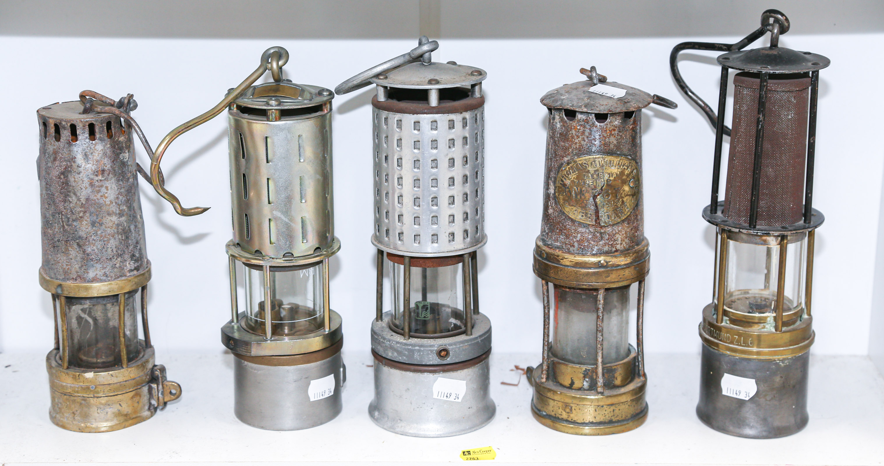 Appraisal: FIVE ASSORTED MINERS' LAMPS Late th and early th century