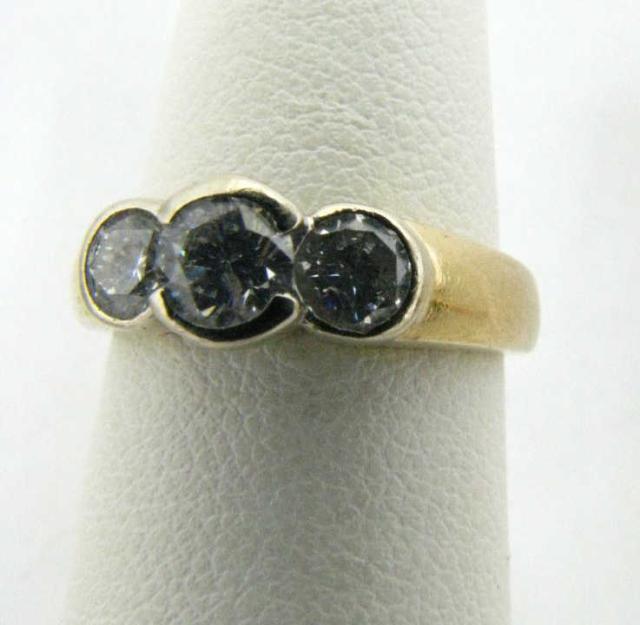 Appraisal: k yellow gold bezel set stone diamond ring with approx