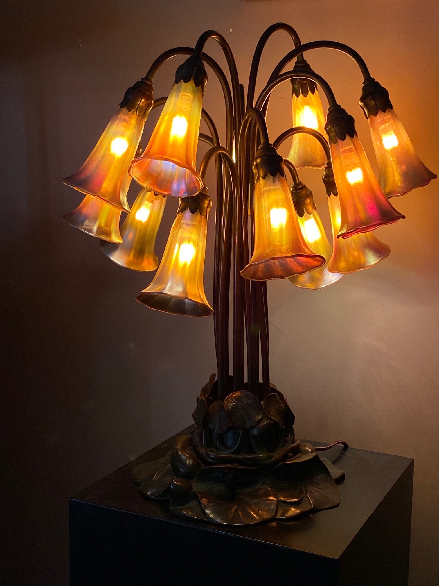 Appraisal: TIFFANY STUDIOS NEW YORK GLASS AND BRONZE TWELVE-LIGHT-LILY TABLE LAMP