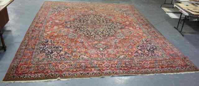 Appraisal: Antique Sarouk Style Carpet with Center Medallion From a Scarsdale