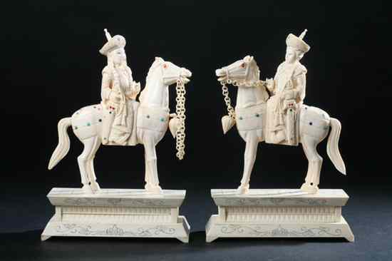 Appraisal: PAIR CHINESE IVORY EQUESTRIAN FIGURES - in high