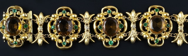 Appraisal: A paste panel bracelet and a pair of ear pendants