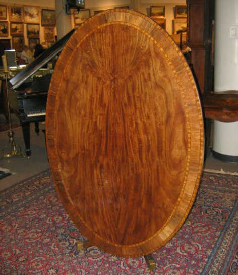 Appraisal: ENGLISH TH CENTURY MAHOGANY BREAKFAST TABLE Oval finely crossbanded top