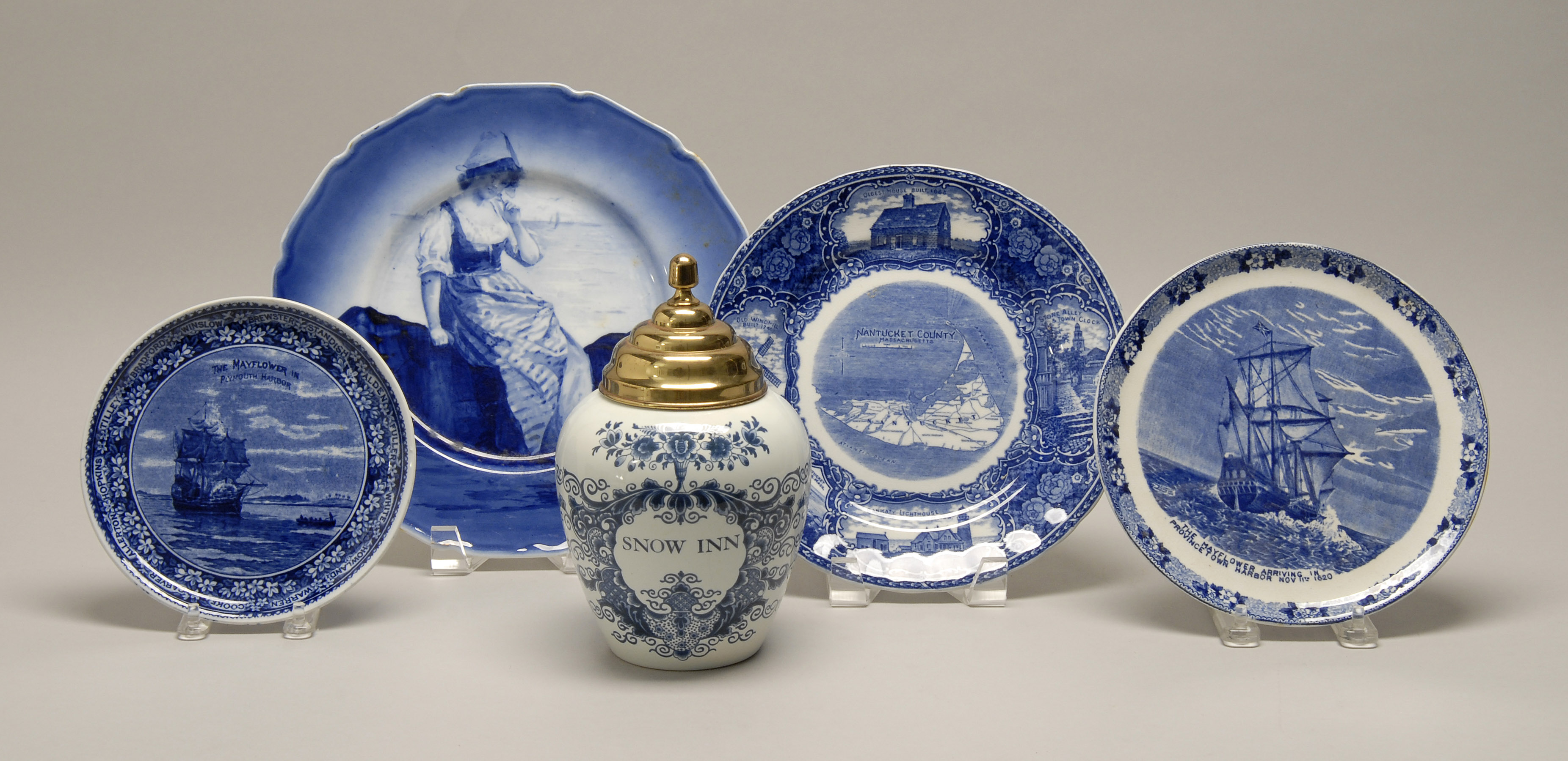 Appraisal: FOUR SEMI-PORCELAIN BLUE AND WHITE TRANSFERWARE PLATES th CenturyTogether with