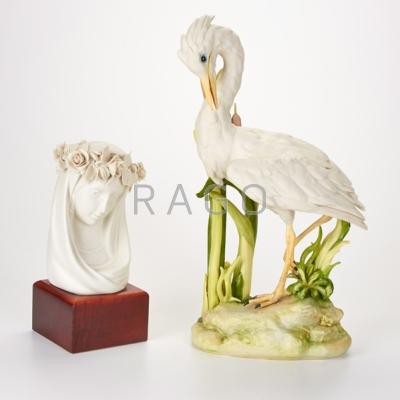 Appraisal: CYBIS Two bisque sculptures Porcelain wood Includes egret and mounted