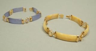 Appraisal: pc K Gold Stone Chinese Style Bracelets One with light