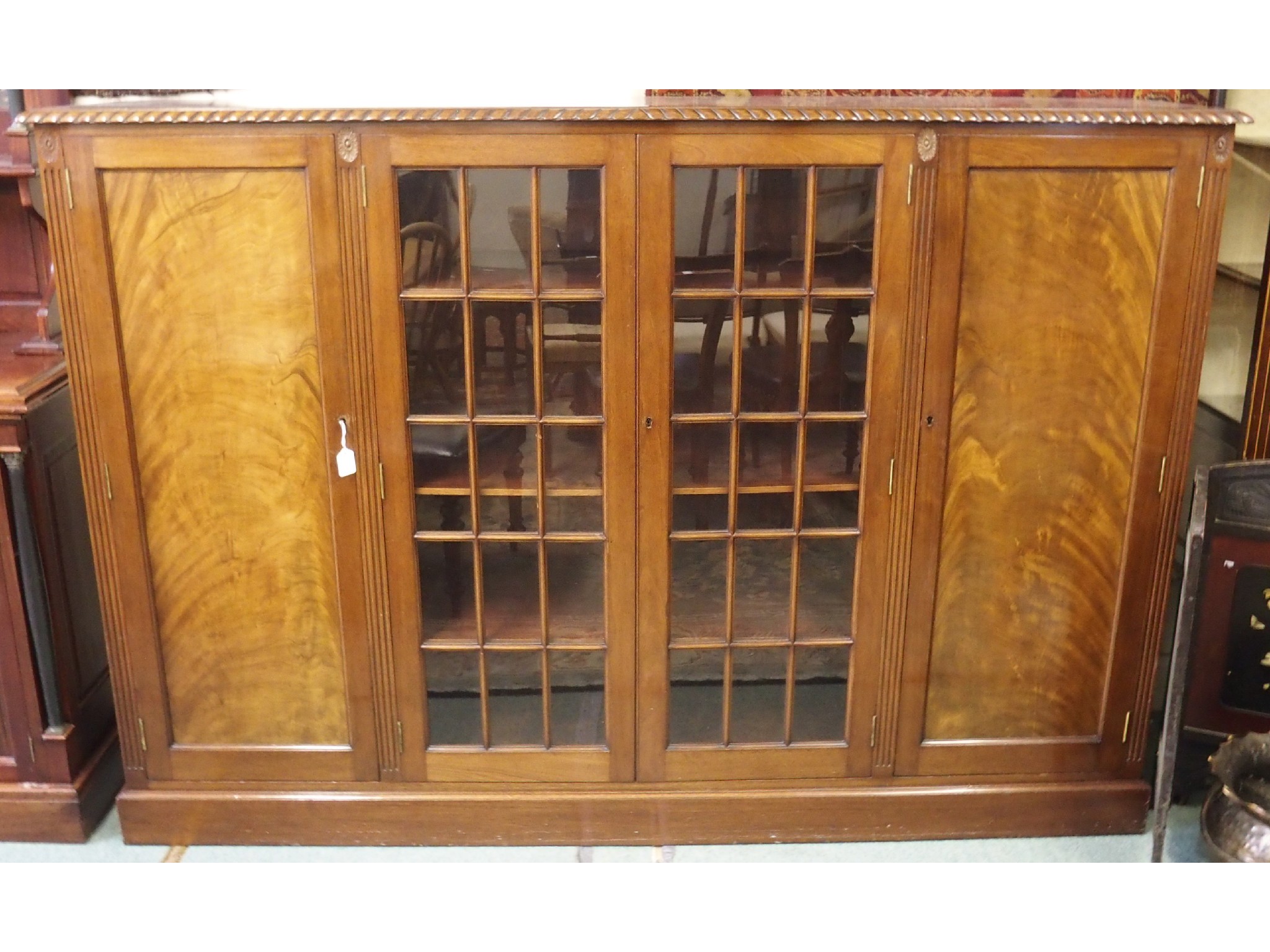 Appraisal: A th Century mahogany glazed display bookcase x x cm