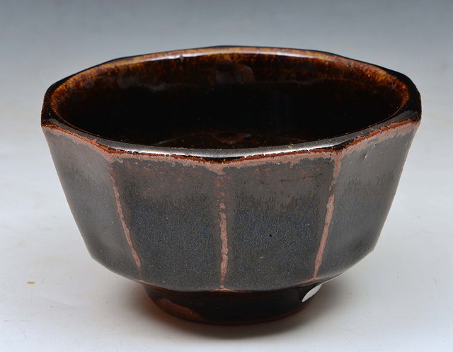 Appraisal: Henry Hammond British - Bowl faceted and tenmoku glaze impressed