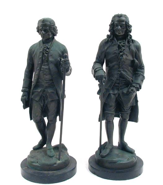 Appraisal: A pair of patinated bronze figures of Voltaire and Rousseau