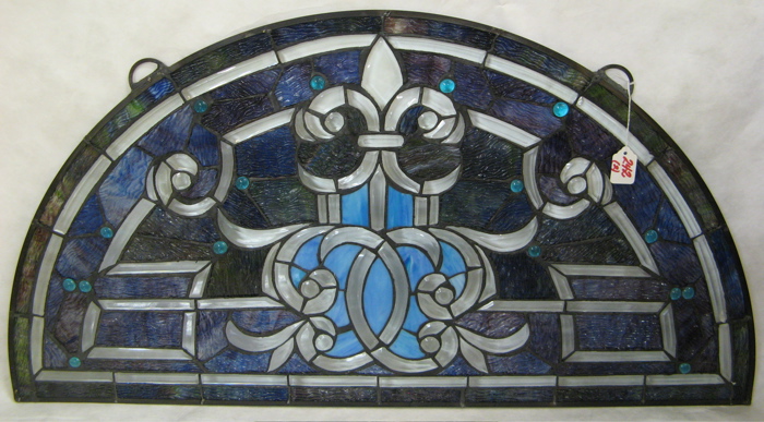 Appraisal: TWO HALF-CIRCULAR SHAPED STAINED AND LEADED GLASS WINDOW PANELS The