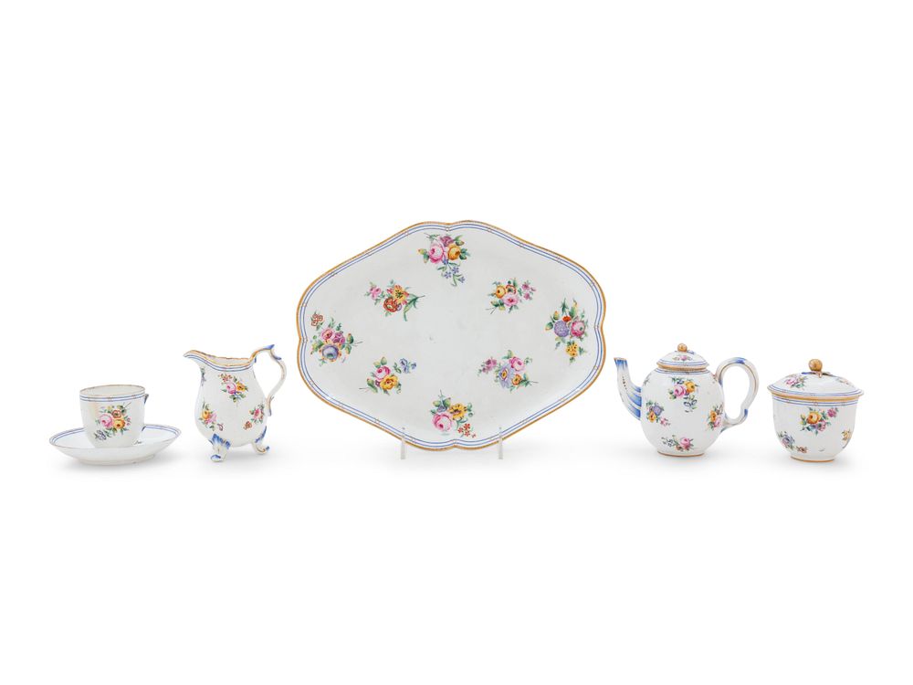 Appraisal: A Sevres Painted and Parcel Gilt Porcelain Tea Service in