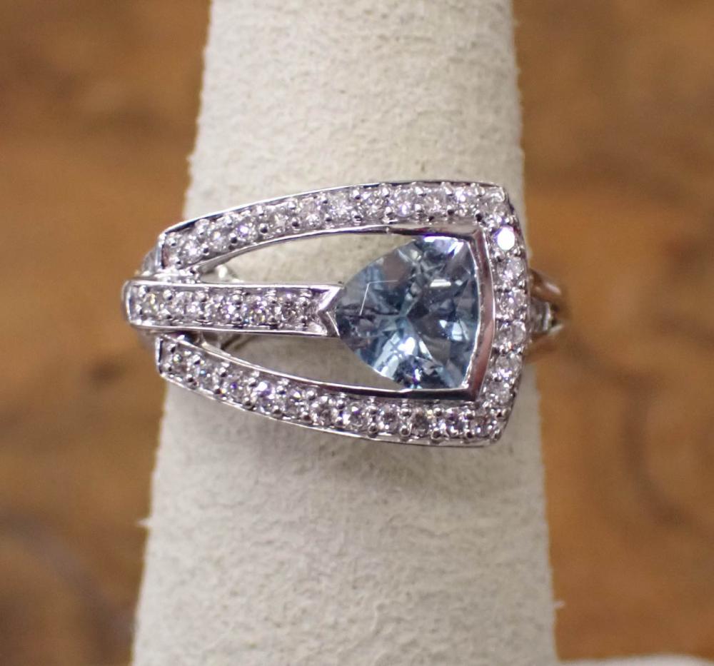 Appraisal: AQUAMARINE DIAMOND AND FOURTEEN KARAT GOLD RING The white gold