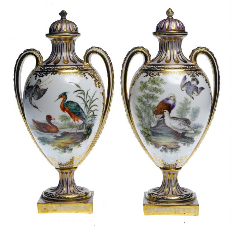 Appraisal: A PAIR OF COALPORT TWO HANDLED VASES AND COVERS painted