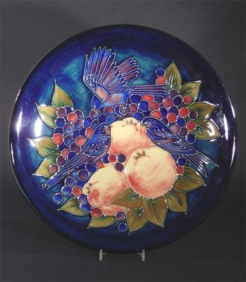 Appraisal: Finches Blue' a Moocroft Pottery charger designed by Sally Tuffin