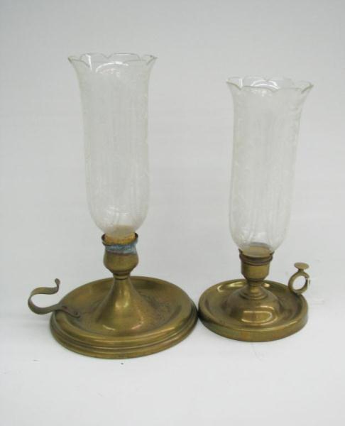 Appraisal: Two antique hurricane lamps with brass bases and etched floral