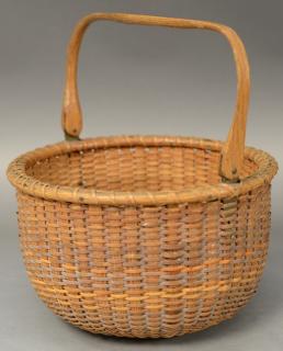 Appraisal: Nantucket lightship basket with swing handle having original paper label