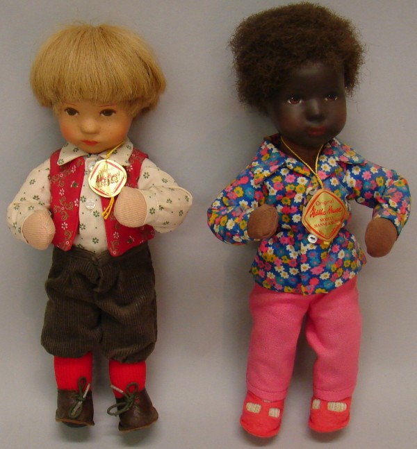 Appraisal: Pair of tagged - Daumlinchen dolls Synthetic heads cloth bodies