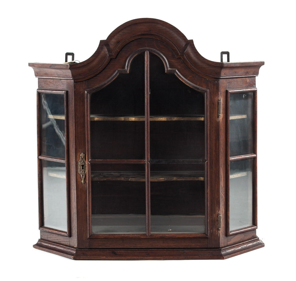 Appraisal: Dutch style walnut hanging cabinet th century single door and