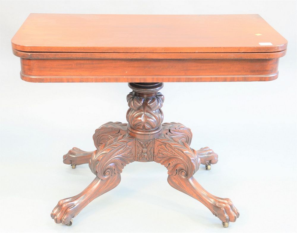 Appraisal: Empire mahogany card table carved pedestal base on claw feet