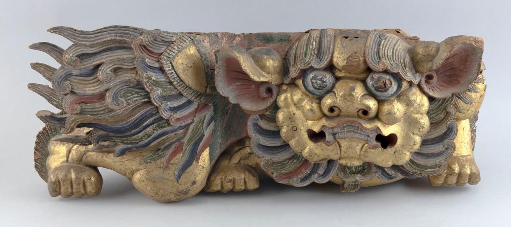 Appraisal: CHINESE POLYCHROME AND GILTWOOD CARVING OF A FU LION DRAGON