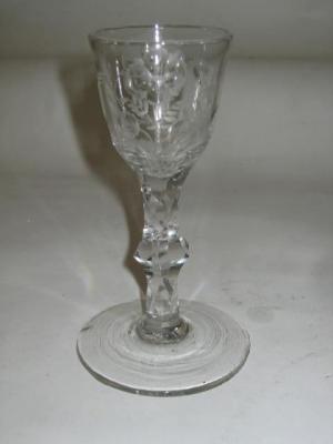 Appraisal: A GEORGIAN WINE GLASS c the ogee bowl cut with